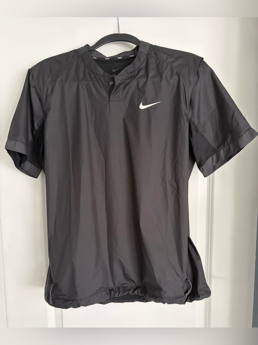Nike Black Short-Sleeve Utility Jacket with White Swoosh